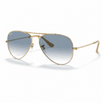 Ray-Ban RB3025 001/3F lentes de sol con diseño piloto, montura oro arista y cristales azul claro degradado, vista angular sobre fondo blanco.