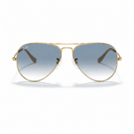 Ray-Ban RB3025 001/3F lentes de sol con montura oro arista y cristales azul claro degradado, vista frontal sobre fondo blanco.