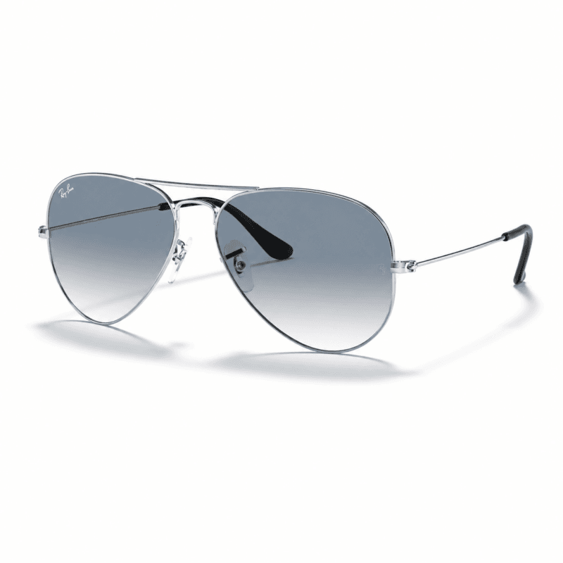 Lentes de sol Ray-Ban RB3025 003/3F con diseño piloto, montura pulido plateado y cristales azul claro degradado, vista angular sobre fondo blanco.