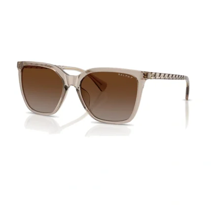 Ralph RA5328U 5802T5 con montura beige cristal y lentes marrón degradado polarizado, vista diagonal sobre fondo blanco.