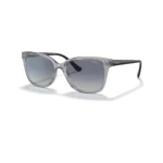 Vogue VO5426S 27264L con montura gris transparente y lentes gris con degradado azul oscuro, vista diagonal sobre fondo blanco.