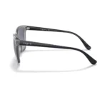 Vogue VO5426S 27264L con montura gris transparente y lentes gris con degradado azul oscuro, vista lateral sobre fondo blanco.